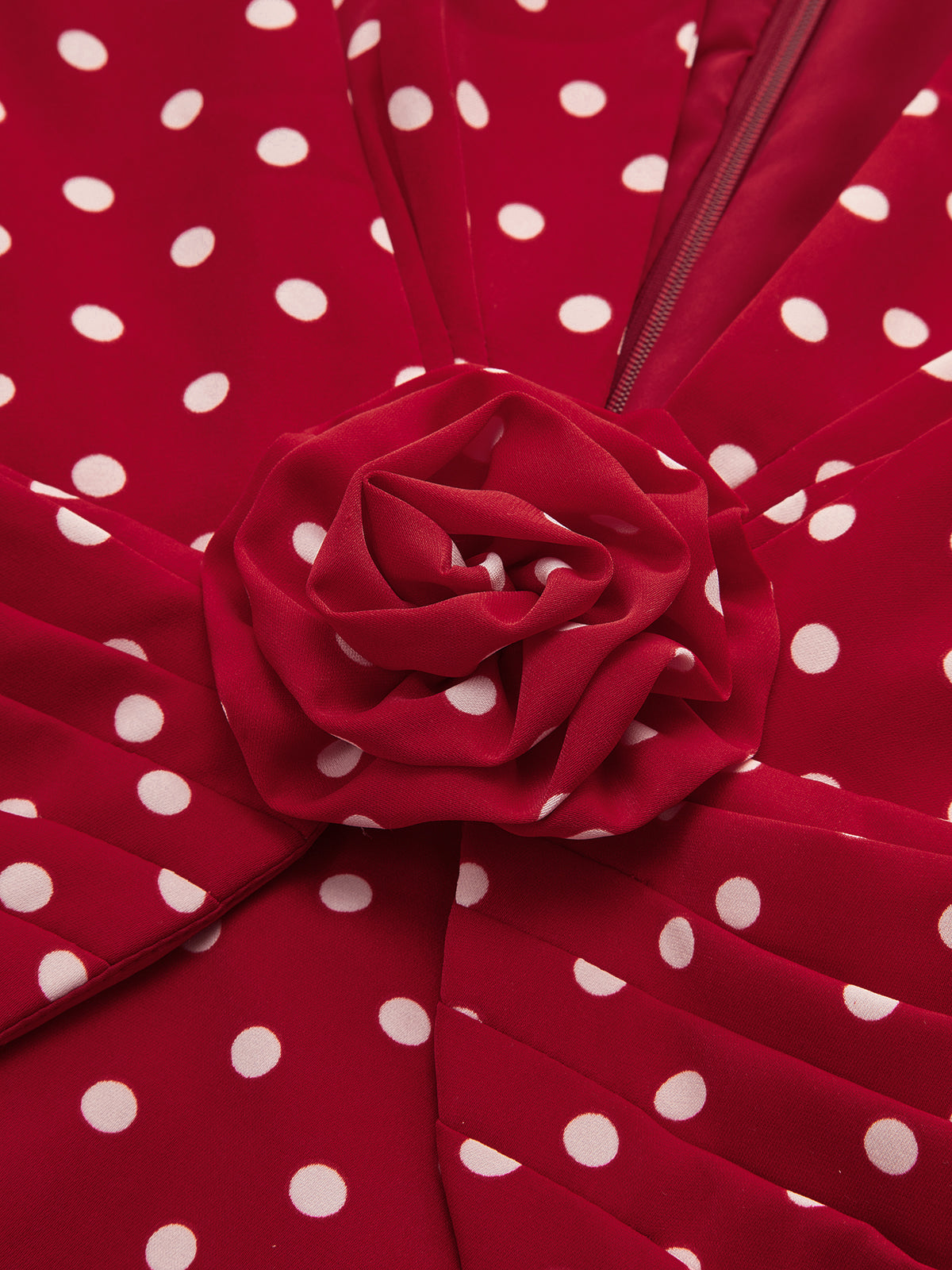 Ensemble haut et jupe à pois et rosettes 