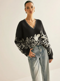 Pull col en V à motif floral
