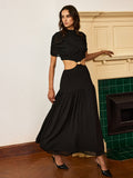 Robe longue en mousseline découpée avec détails métalliques