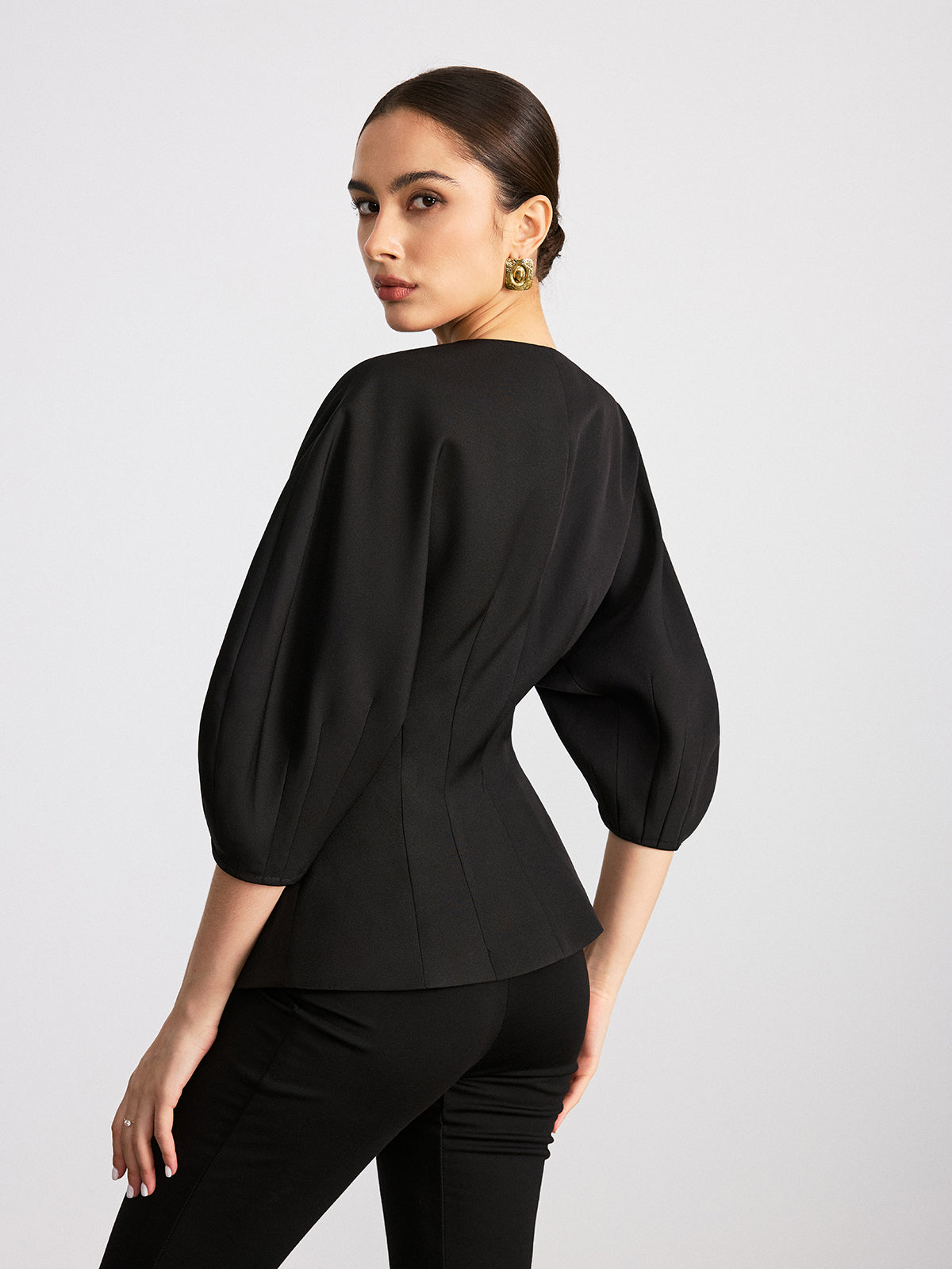 Bluse mit V-Ausschnitt und Fledermausärmeln 