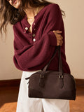 Retro Wildlederhandtasche