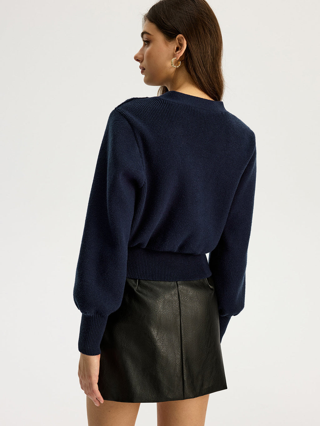 Pull en V avec détail cœur en métal