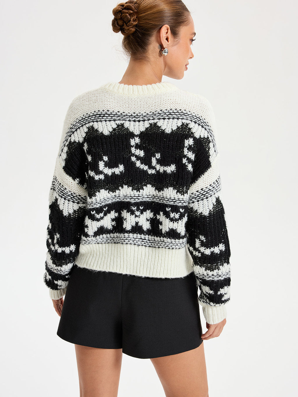 Pull Cowichan à col en V et sequins