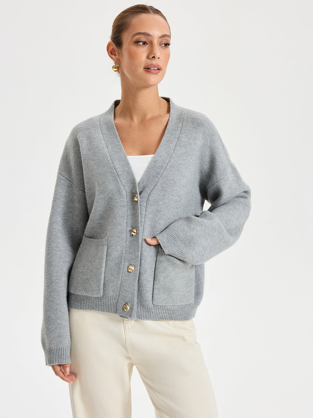 Gilet boutonné en métal à encolure en V avec poches