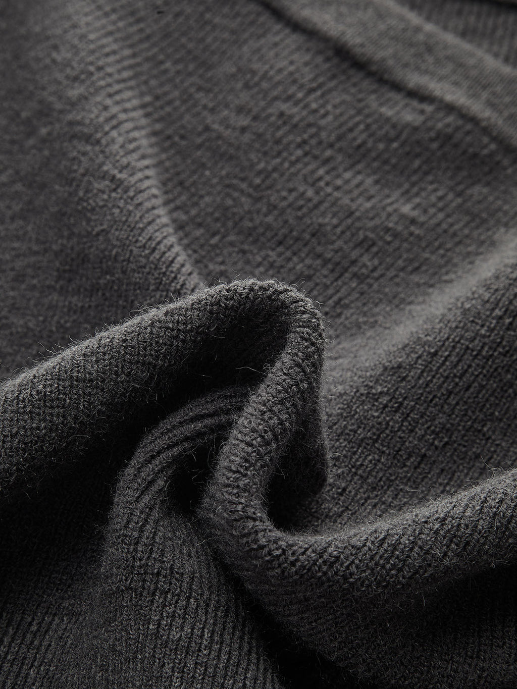 Langärmliges Strickoberteil mit Schößchensaum