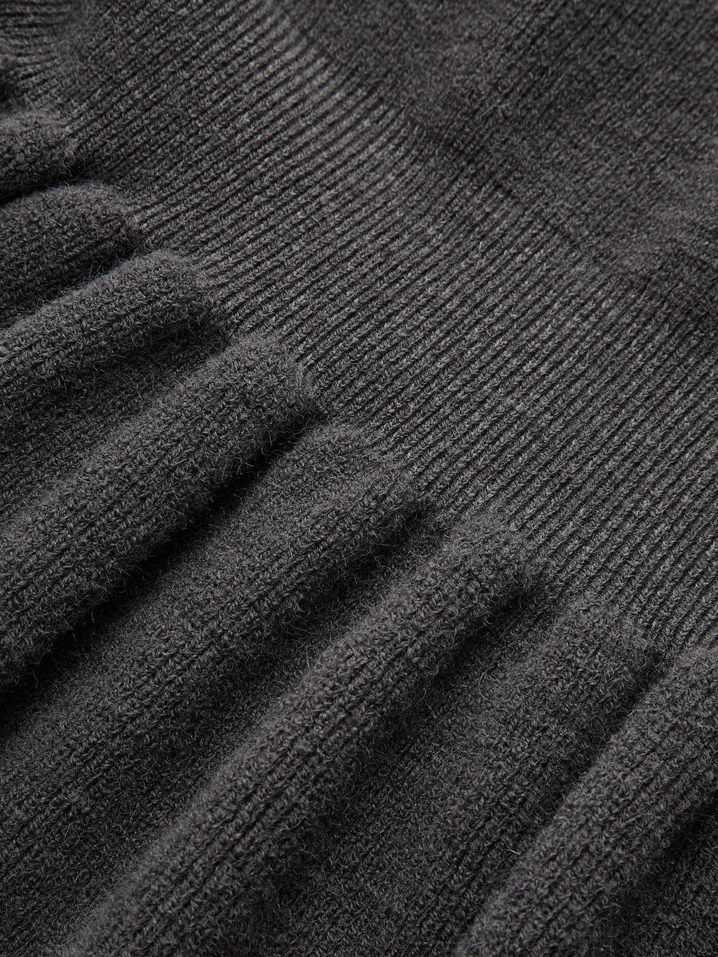 Langärmliges Strickoberteil mit Schößchensaum