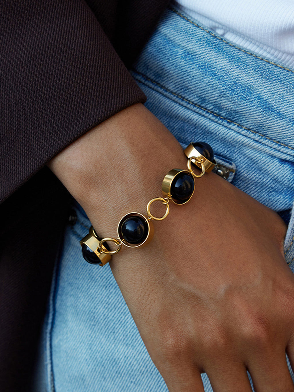 Bracelet avec fermoir mousqueton perle noire rotative