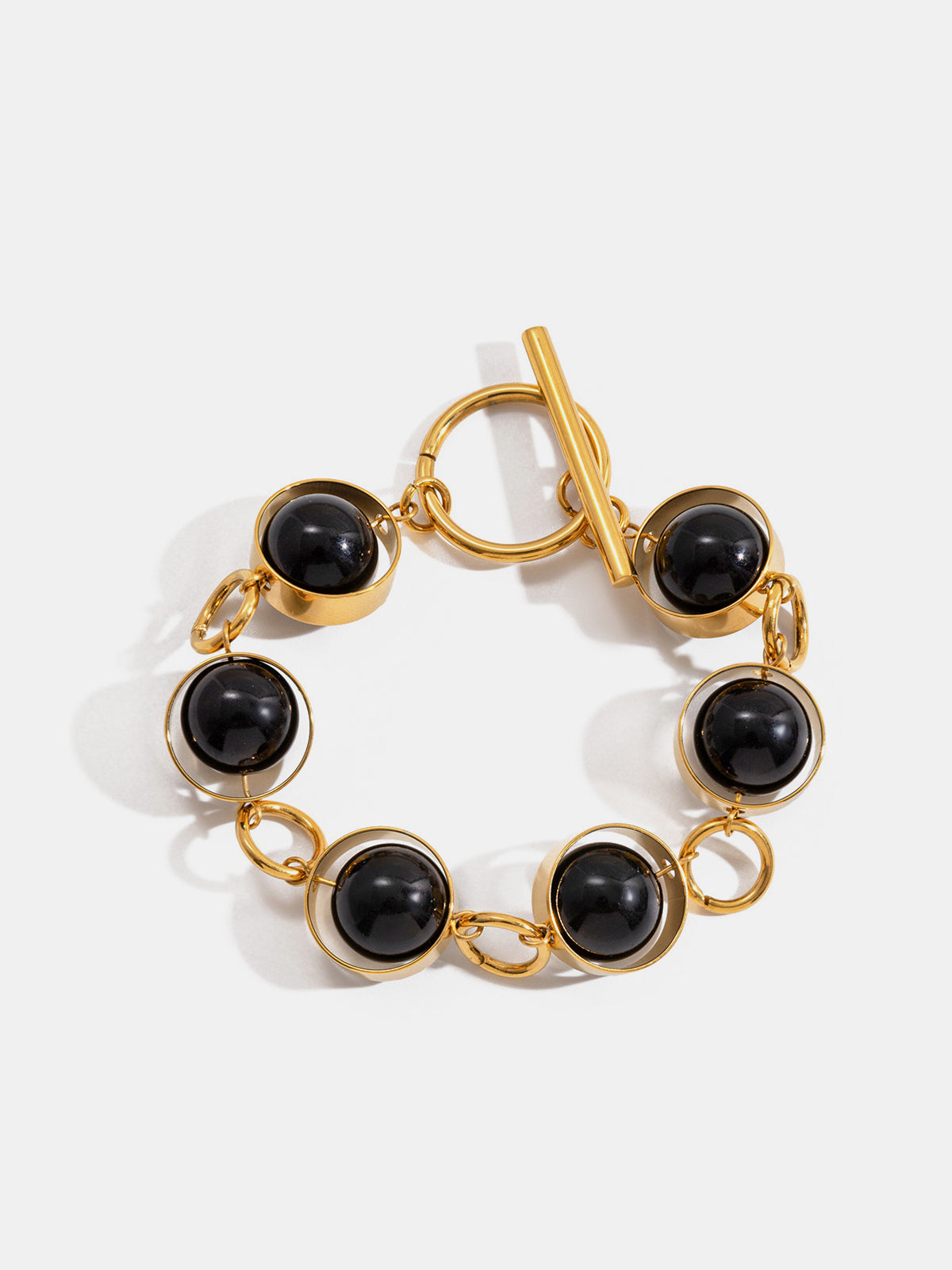Bracelet avec fermoir mousqueton perle noire rotative