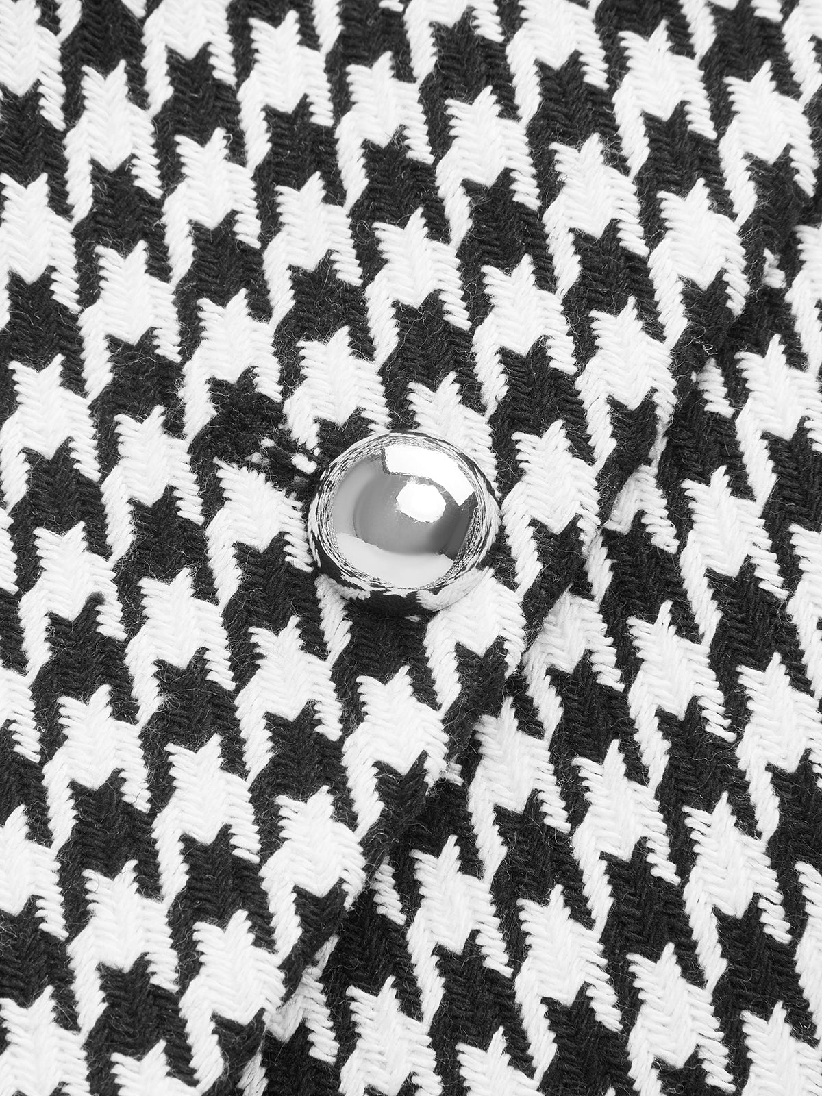 Ensemble gilet boutonné pied-de-poule et mini-jupe 