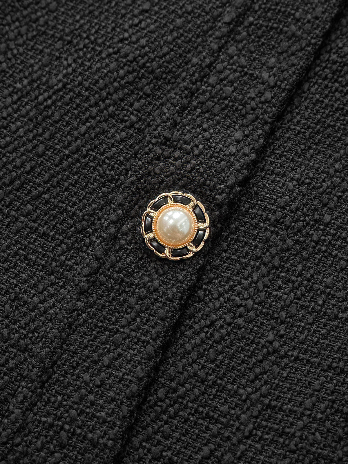 Robe mini boutonnée sans manches en tweed 