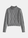 Pull à col montant en tricot torsadé