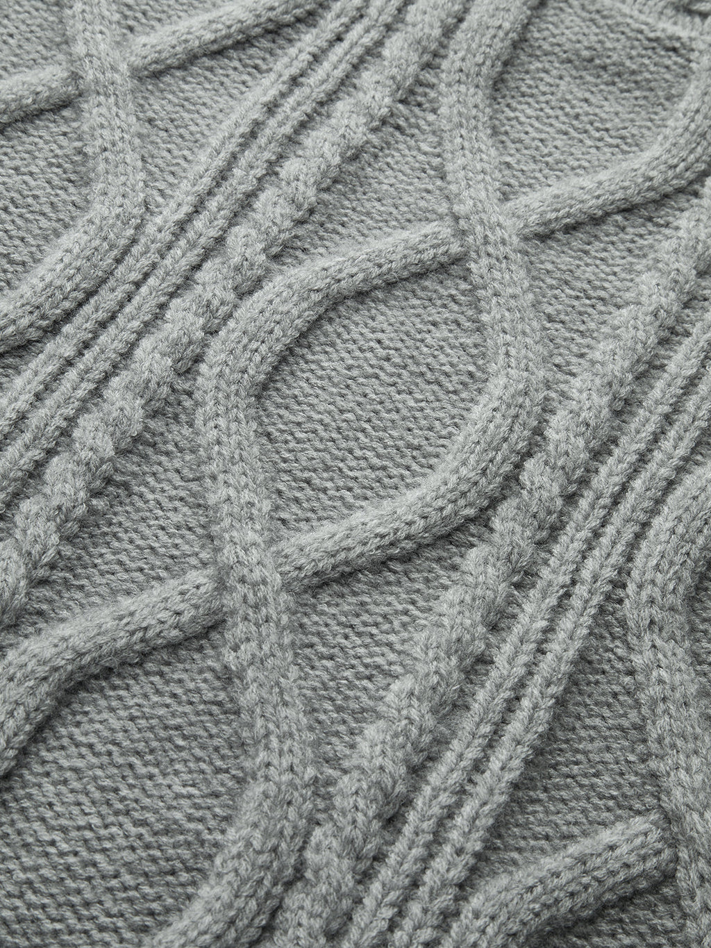 Pull à col montant en tricot torsadé