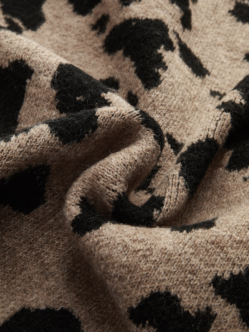 Strickpullover mit Leopardenmuster und Schleifendetail