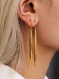 Boucles d'oreilles pendantes en forme de goutte longues dorées