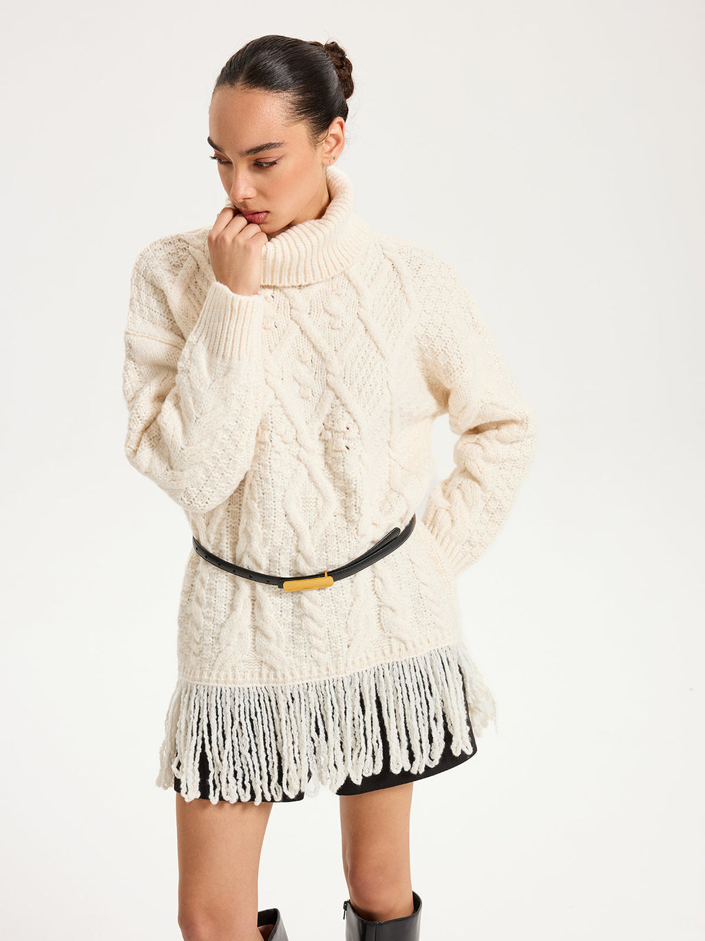 Pull à col roulé torsadé avec ourlet à franges