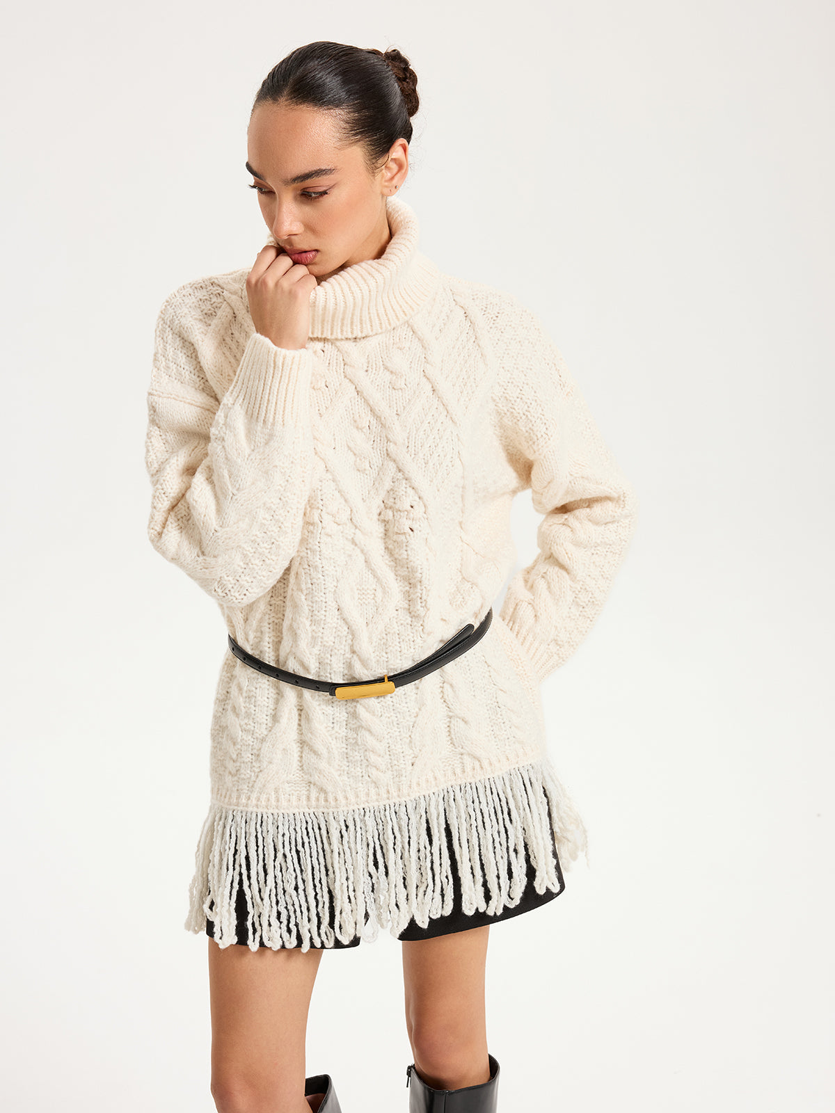 Pull à col roulé torsadé avec ourlet à franges