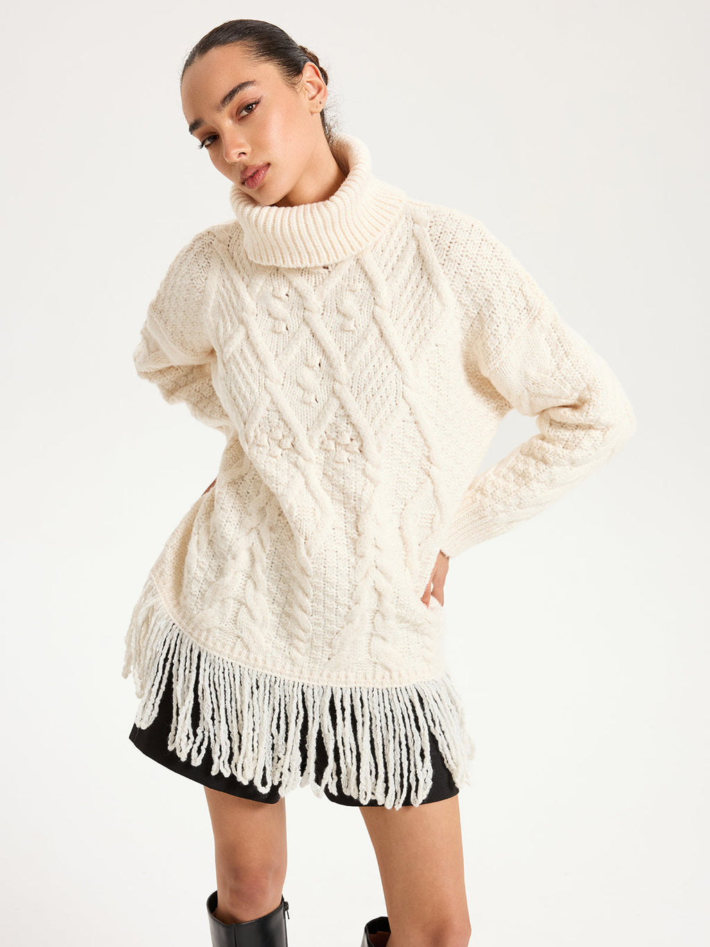 Pull à col roulé torsadé avec ourlet à franges