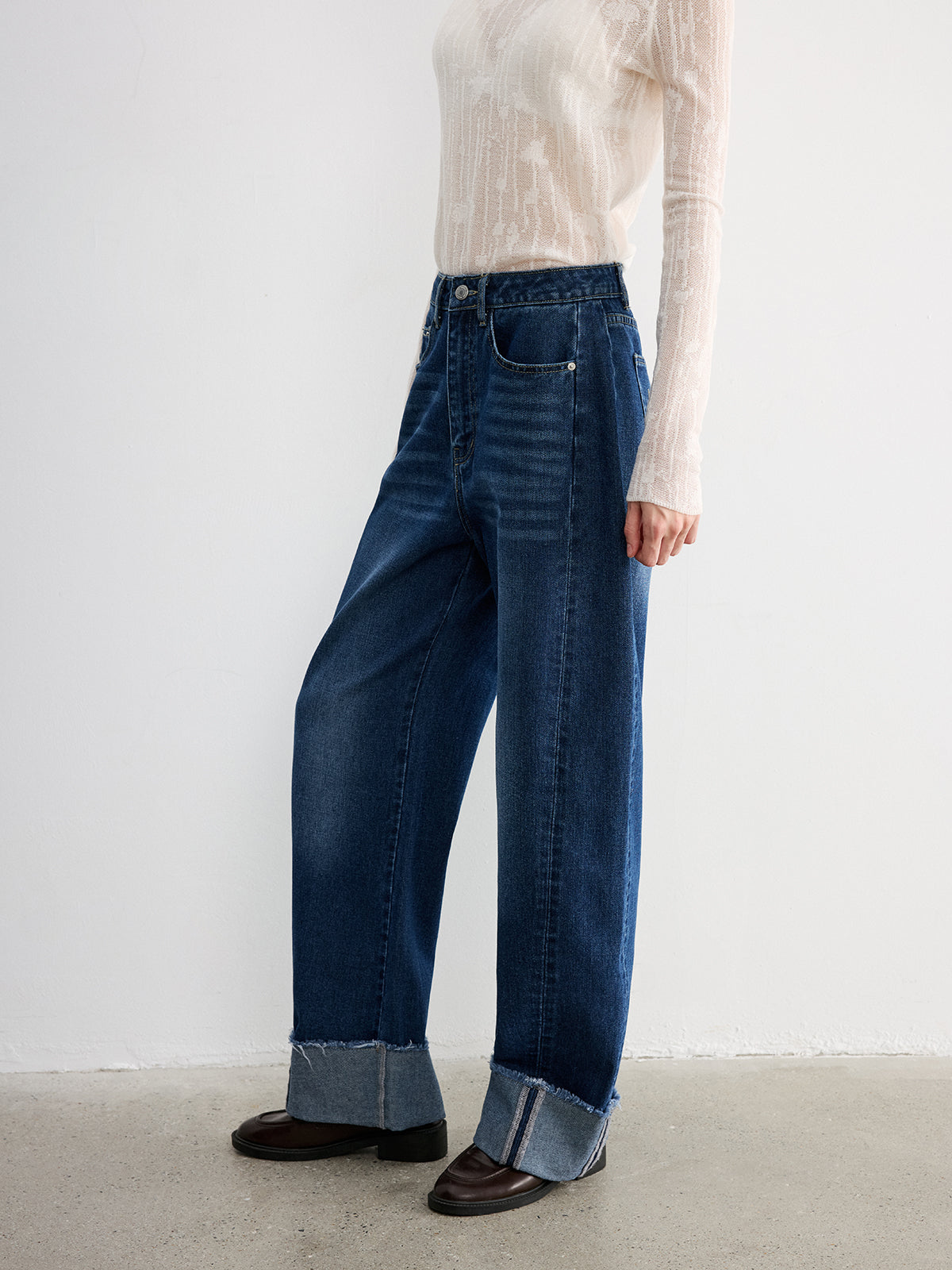 Jean large en denim à revers effilochés