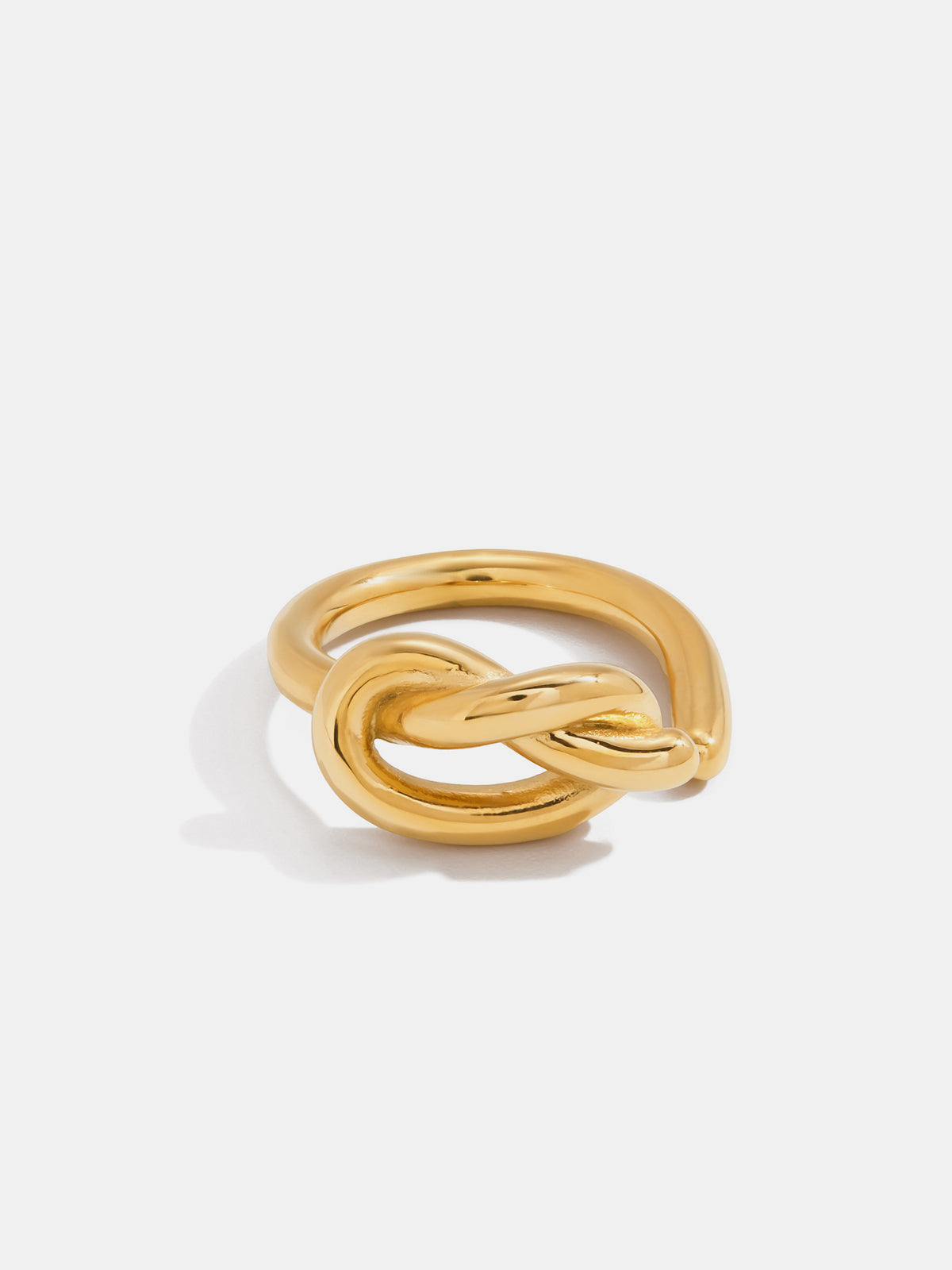 Goldener offener Ring mit Knoten-Design