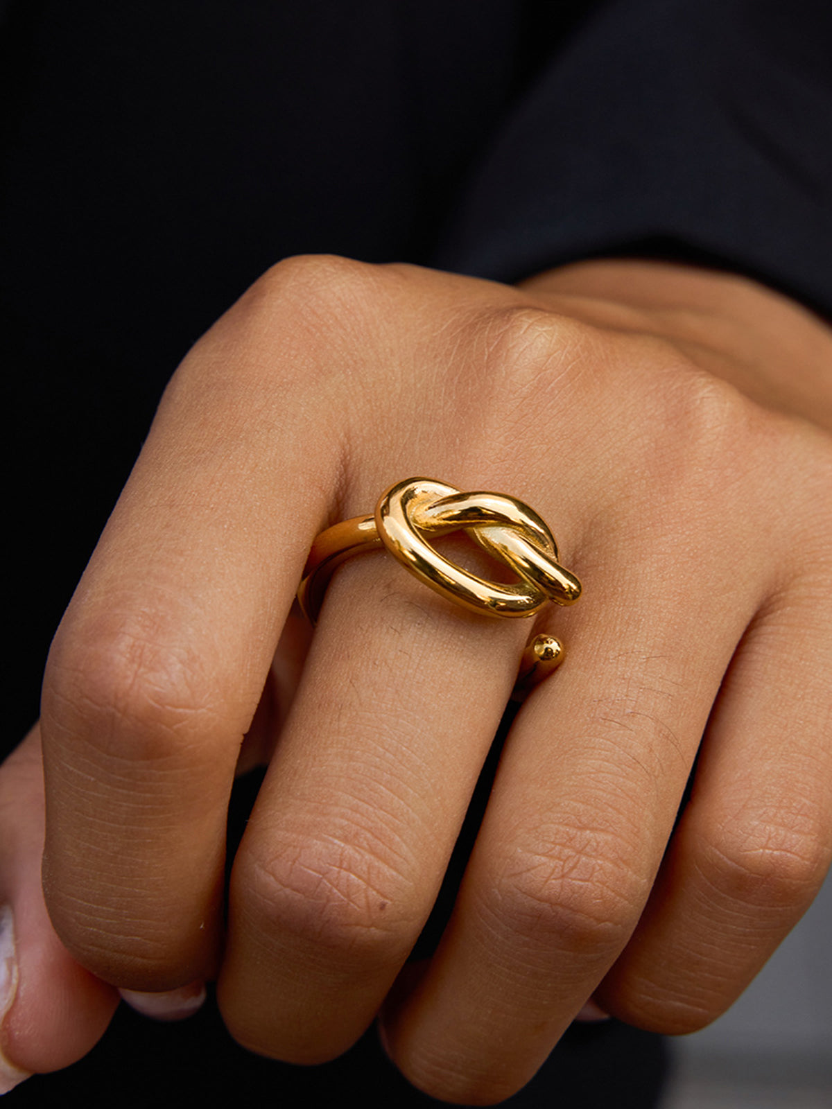 Bague ouverte nœud doré