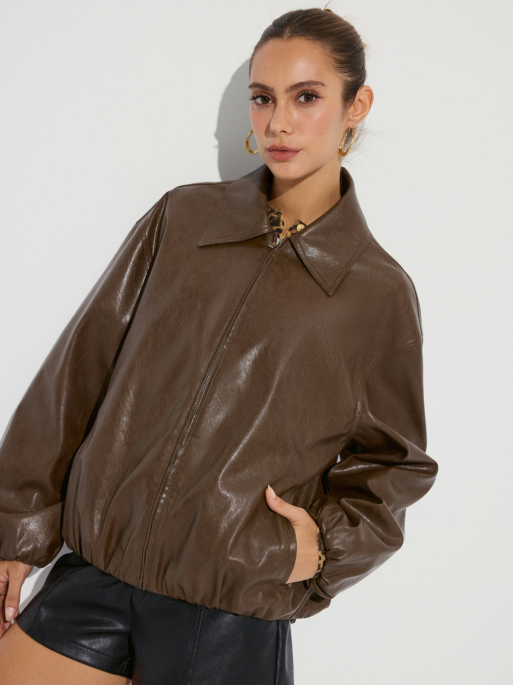 Blouson en similicuir à col et fermeture éclair