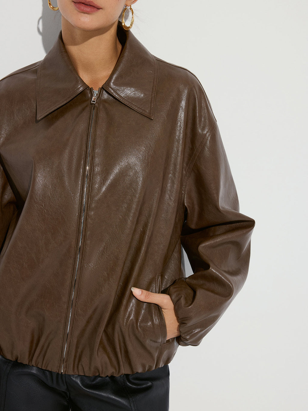 Blouson en similicuir à col et fermeture éclair