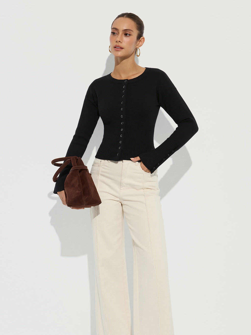 Gilet en maille à encolure ras-du-cou et taille cintrée