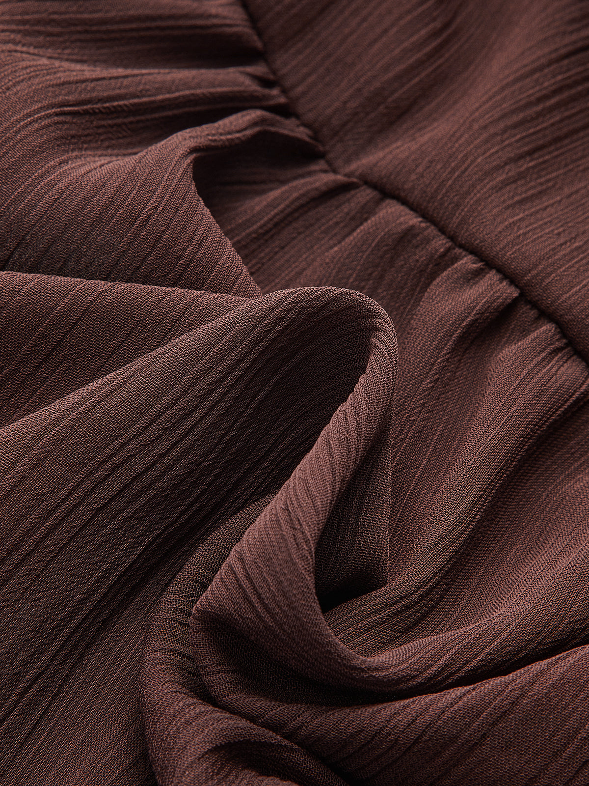 Robe longue à manches longues avec nœud en mousseline