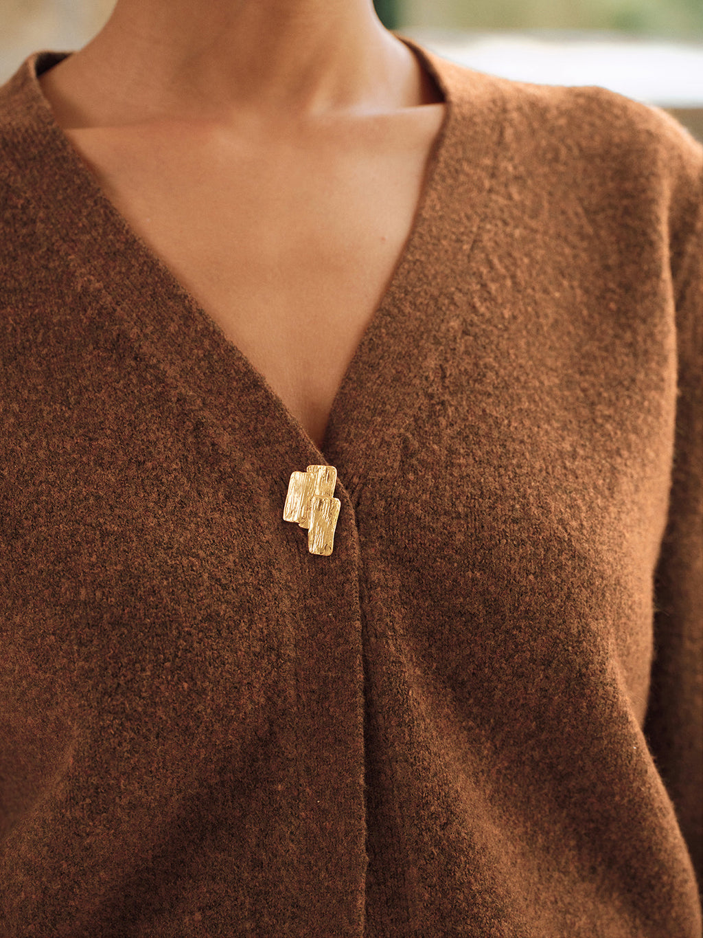 Cardigan en maille à col en V et boutons en métal