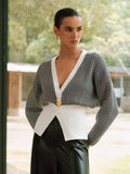 Gilet en maille à chevrons et détails métalliques