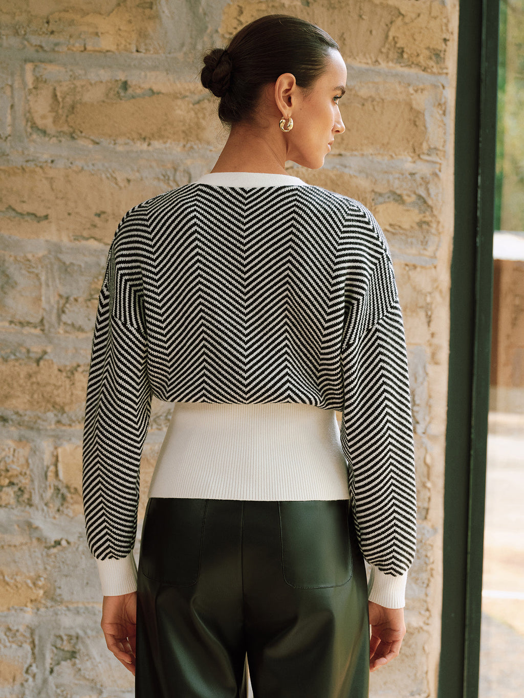 Gilet en maille à chevrons et détails métalliques