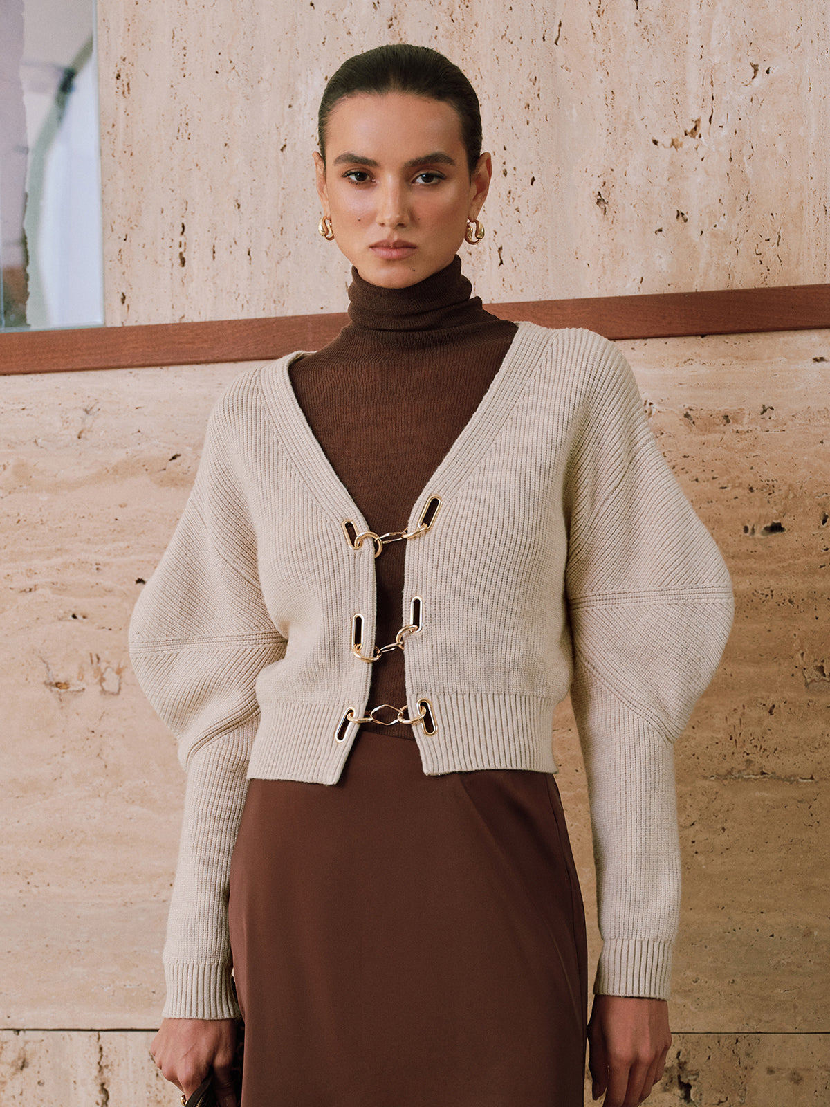 Gilet en maille à manches bouffantes et fermeture chaînette