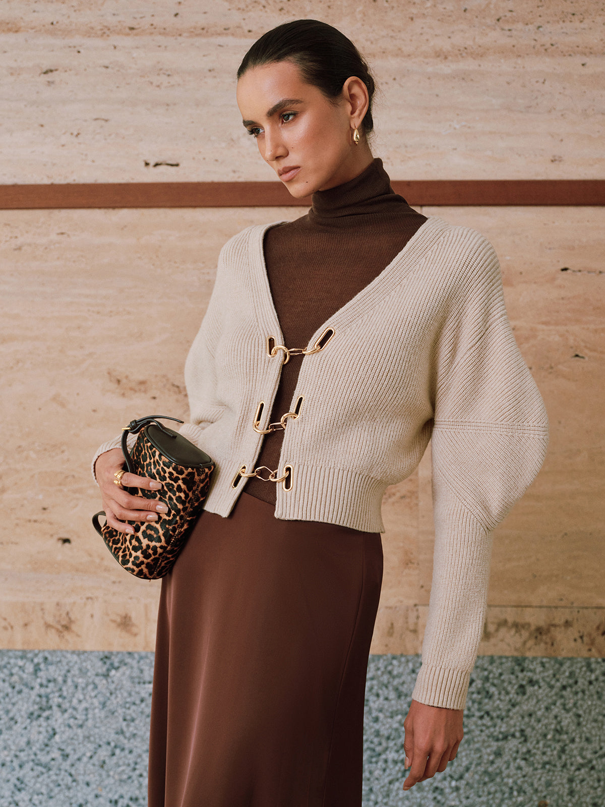 Gilet en maille à manches bouffantes et fermeture chaînette