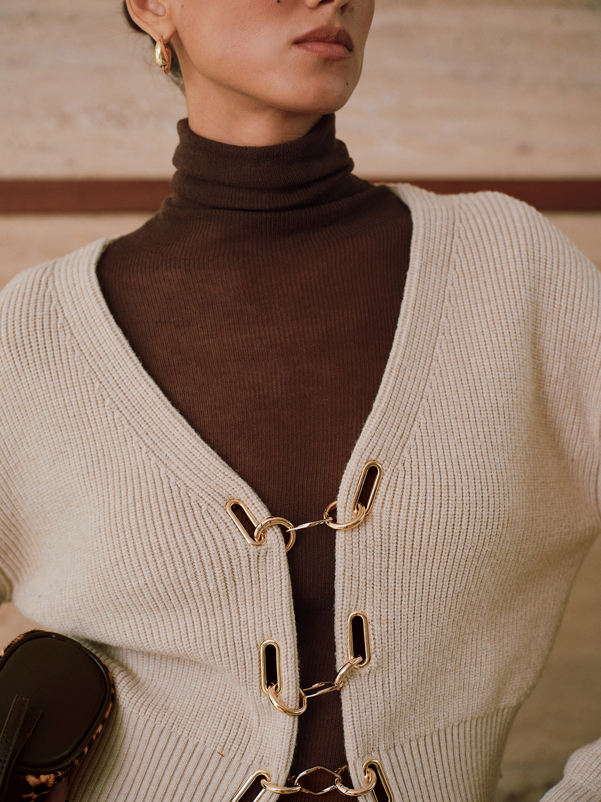 Gilet en maille à manches bouffantes et fermeture chaînette