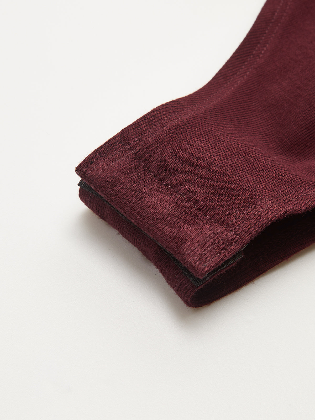 Body sans soutien-gorge à manches longues, dos nu et détails boucles