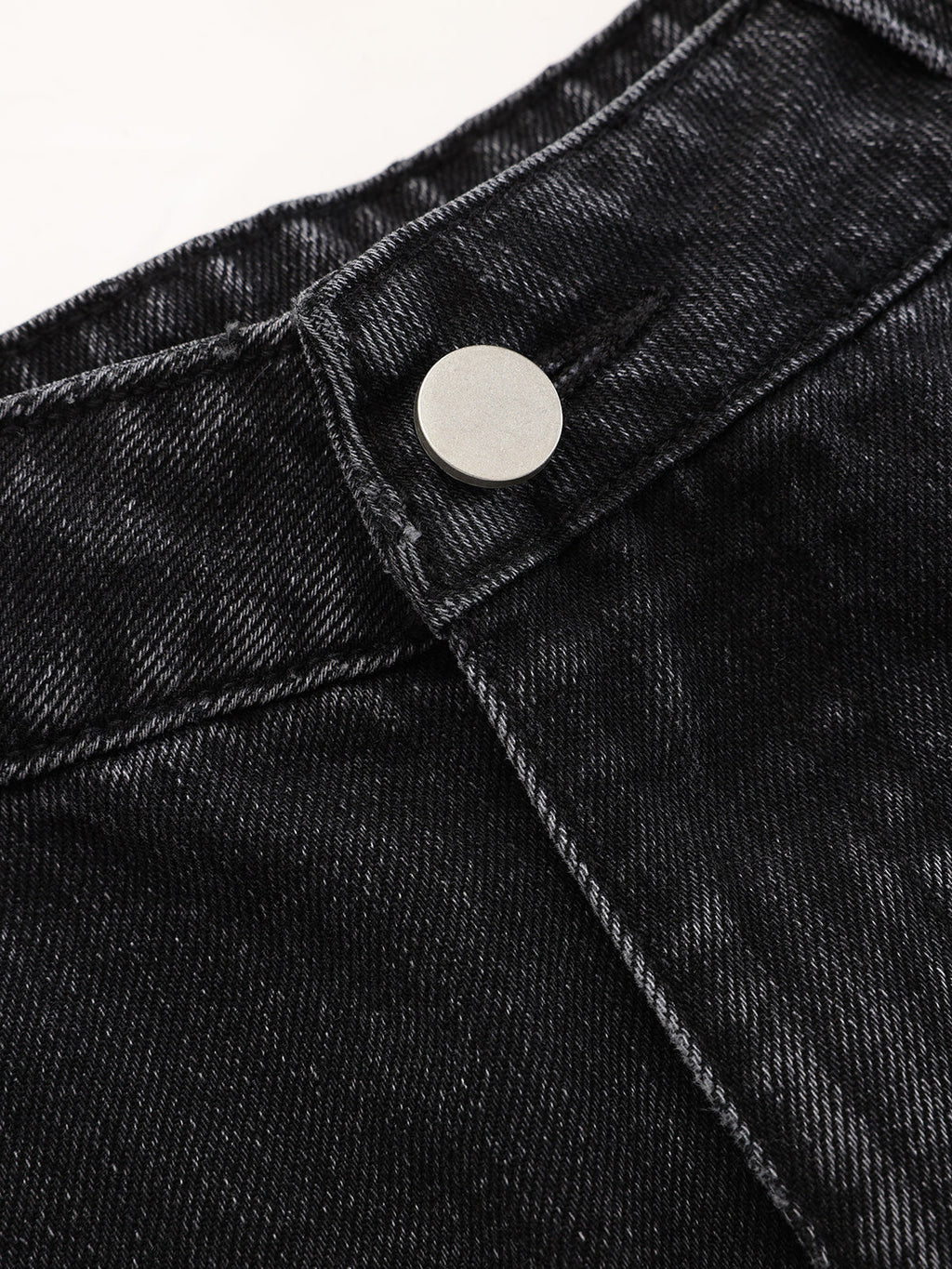 Jean en denim délavé à jambes incurvées
