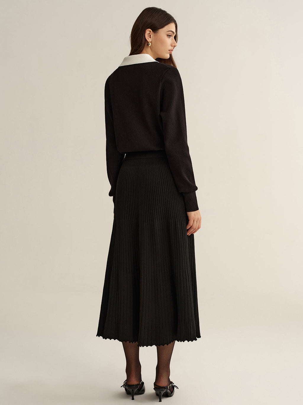 Ensemble top en maille avec bordure contrastante et jupe plissée