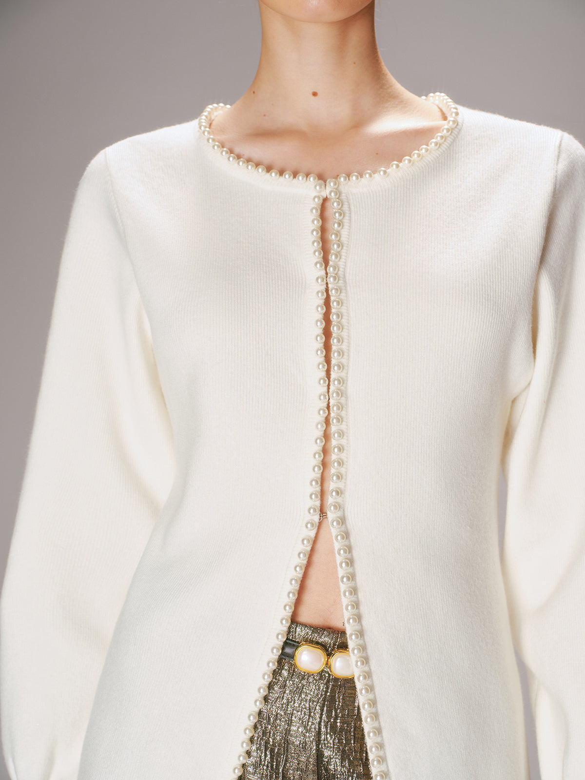 Strickjacke mit Perlenbesatz