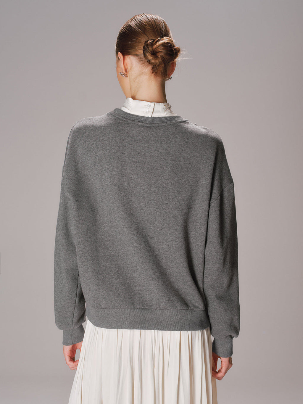 Sweat-shirt col rond coupe oversize avec nœud décoratif