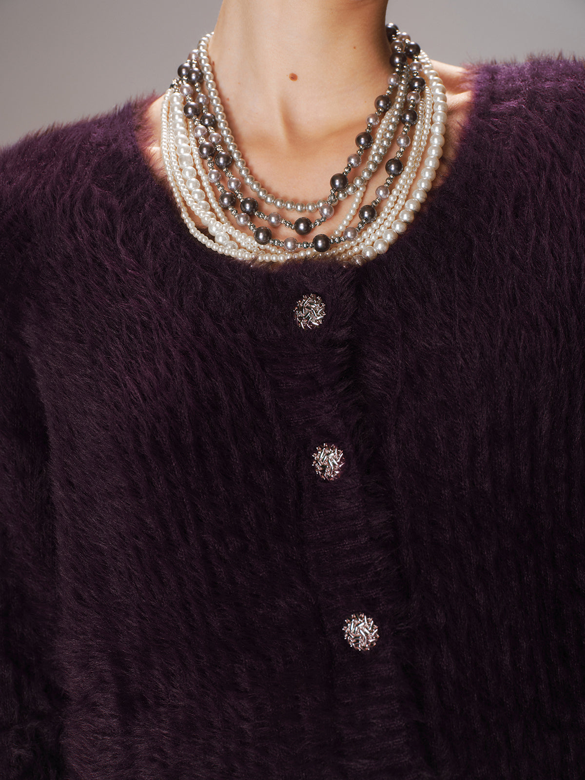 Gilet en maille duveteuse boutonnée