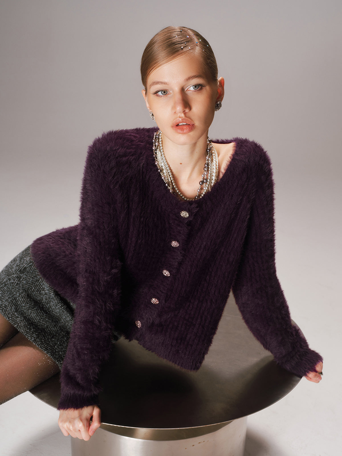 Gilet en maille duveteuse boutonnée
