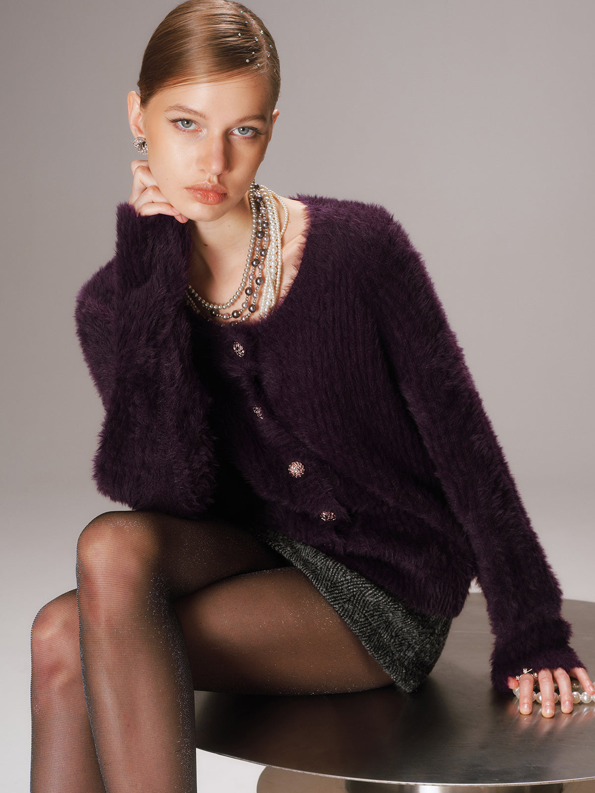 Gilet en maille duveteuse boutonnée