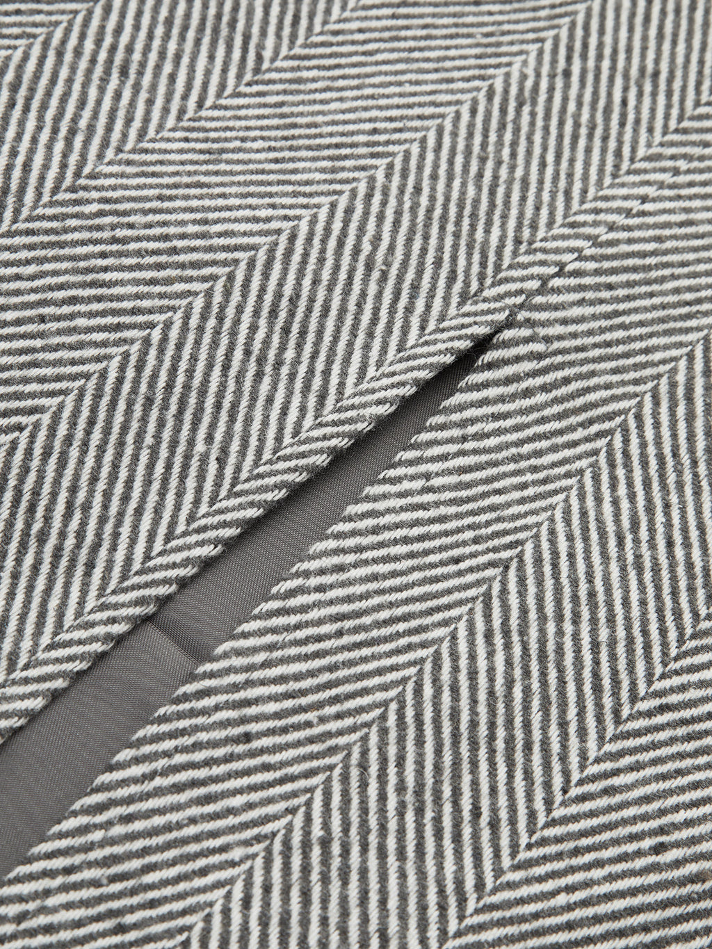 Jupe midi fendue à chevrons et ceinture