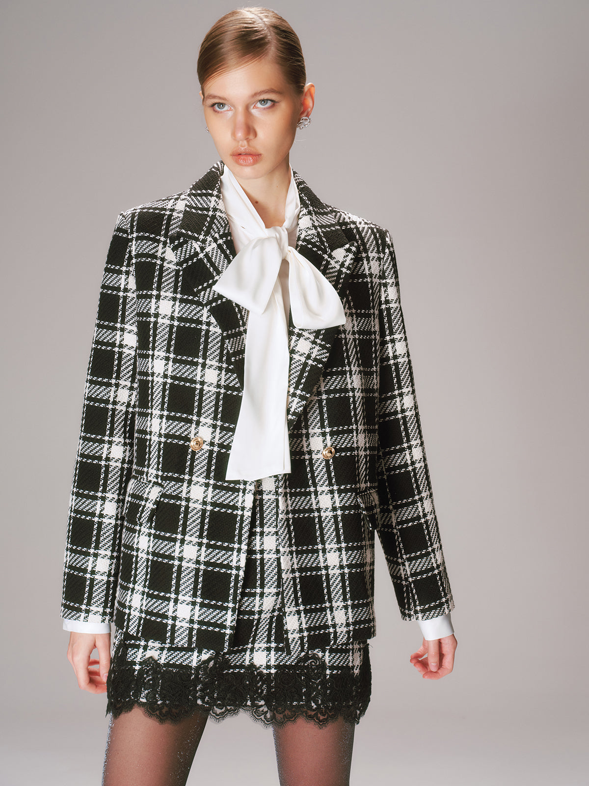 Blazer en tweed à carreaux et boutons métalliques