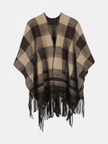 Poncho à carreaux frangé