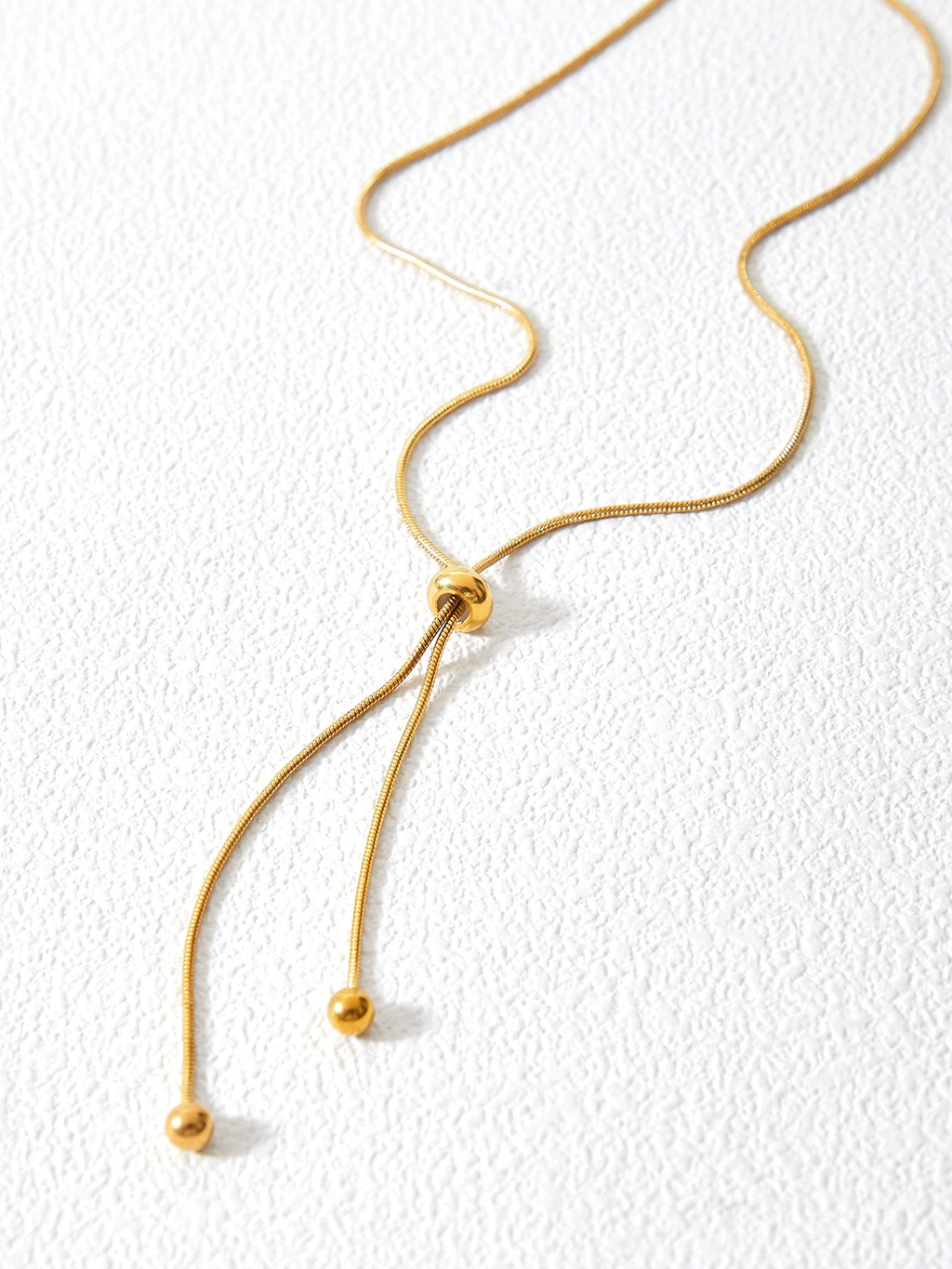Collier de type lariat maille serpent
