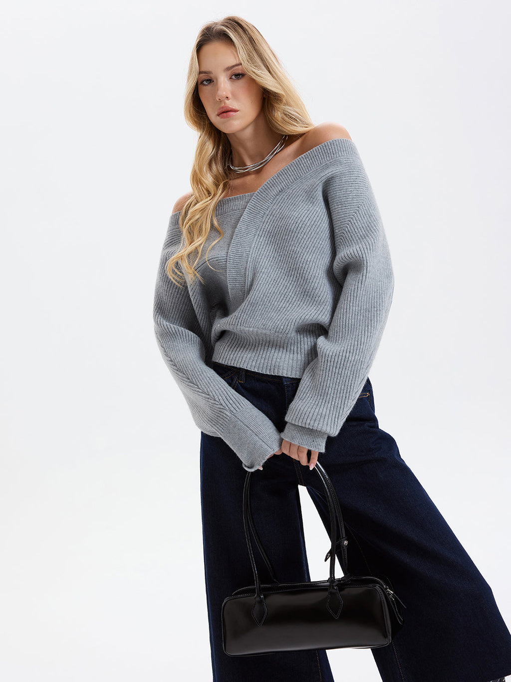 Asymmetrischer Off-Shoulder Rippstrickpullover
