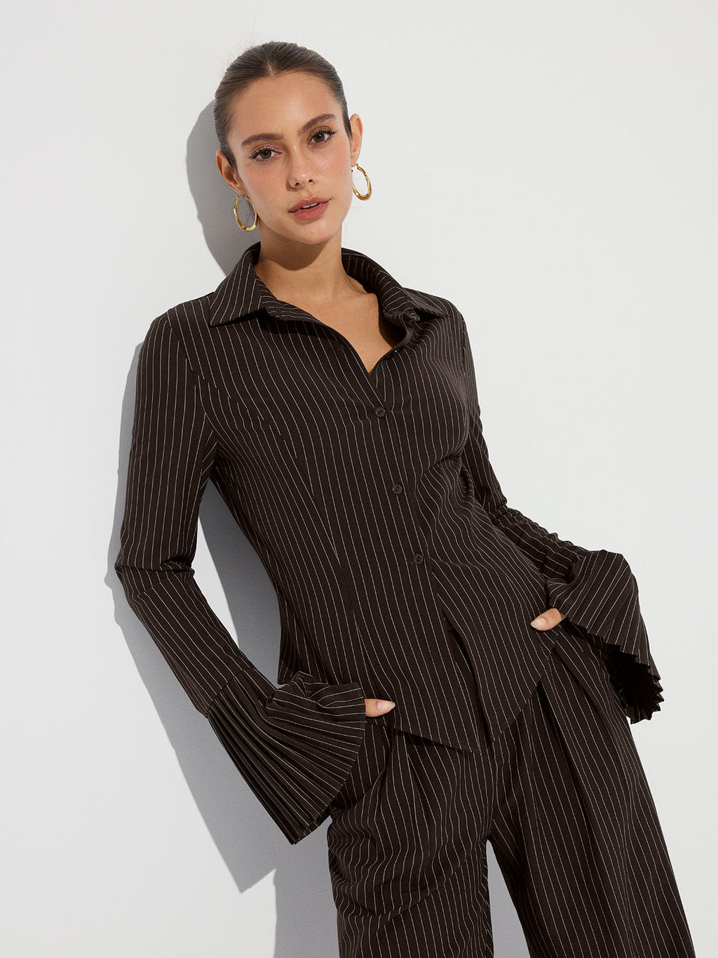 Chemise rayée à poignets évasés
