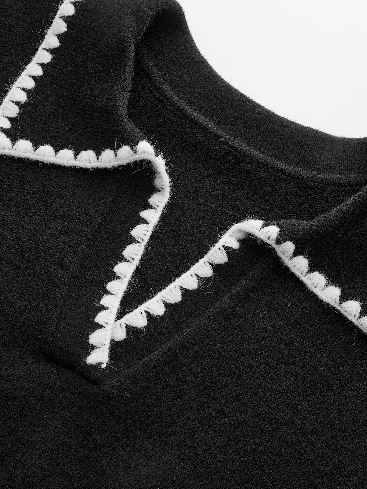 Polo en tricot avec broderie contrastante