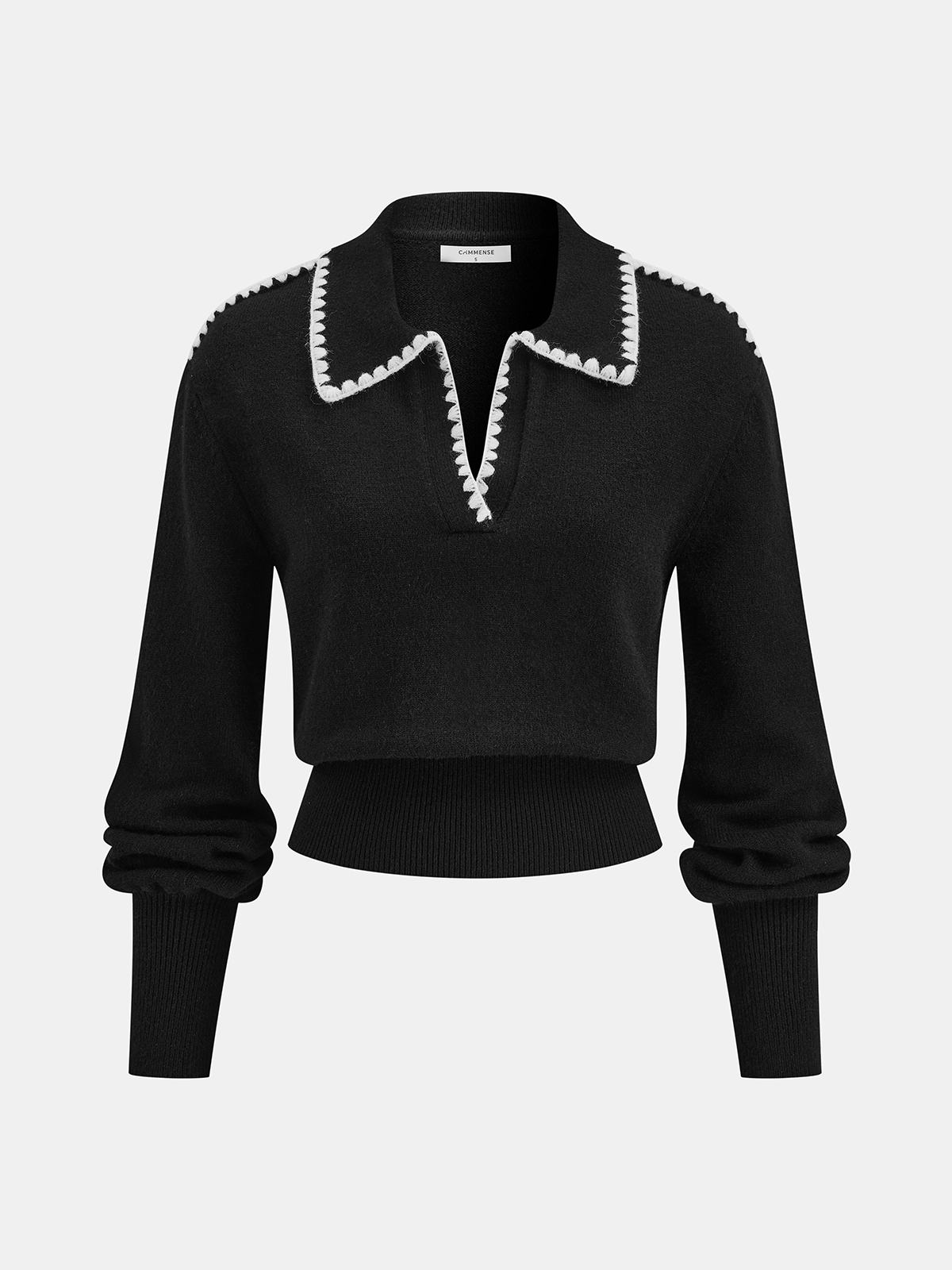 Polo en tricot avec broderie contrastante